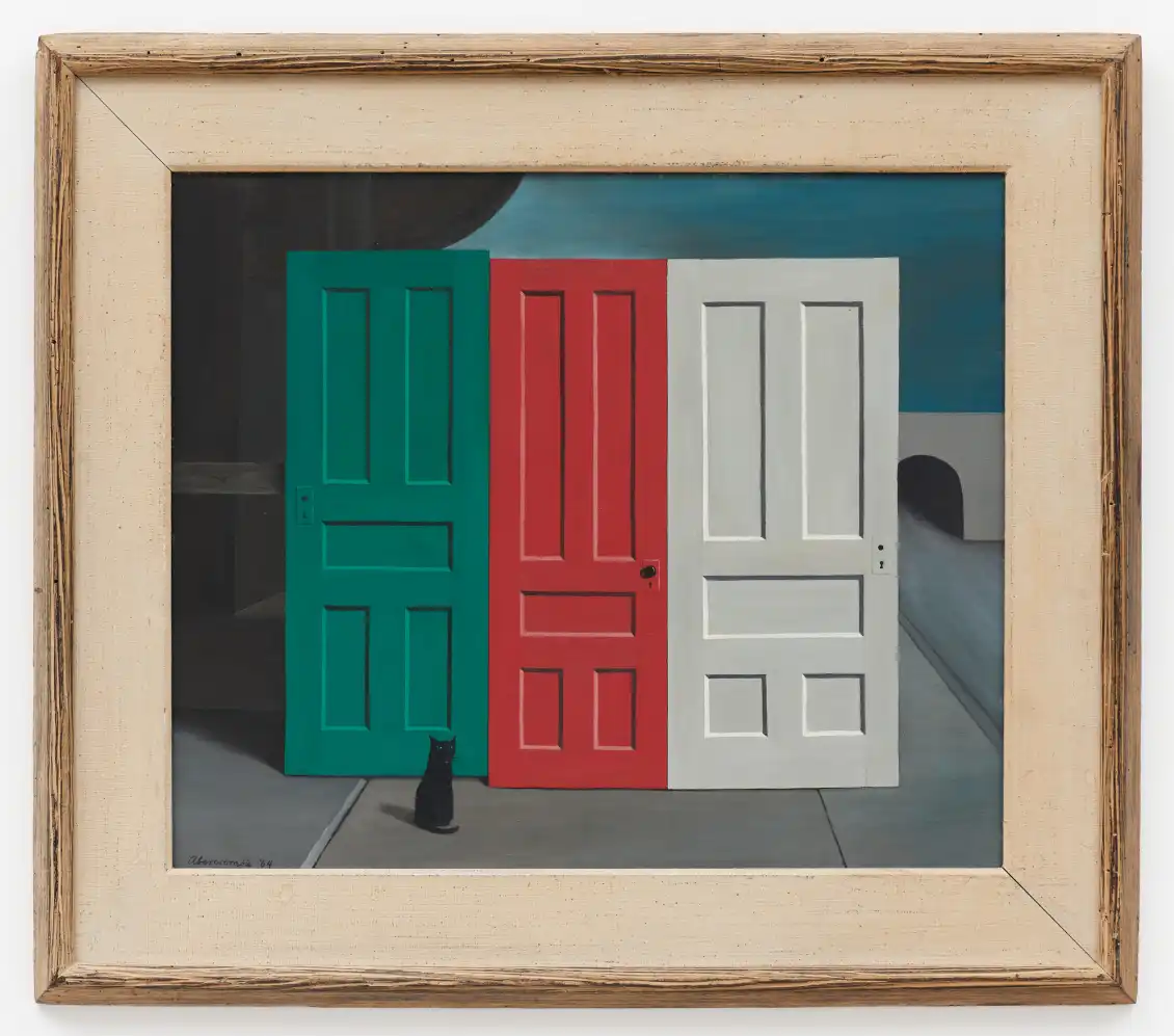 Three doors stand erect outside, unconnected from any building or context. the left is green, the middle red, the right white. A black cat sits at the foot of the green door towards the viewer.