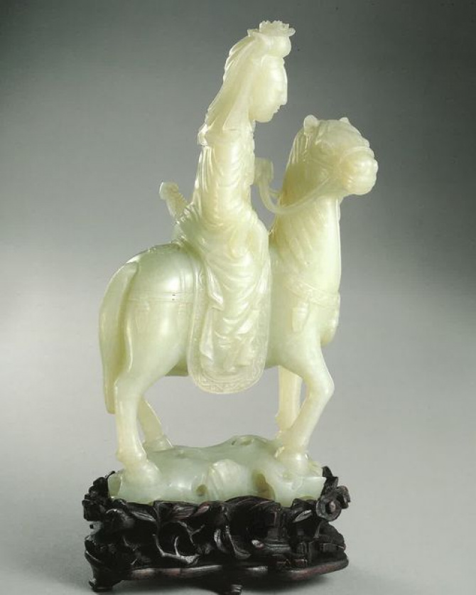 Figure of Mulan on Horseback. Qing dynasty, 18th century. White Jade.